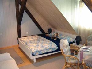 a bedroom with two beds with a teddy bear on it at Apartment Park Crni Lug in Crni Lug