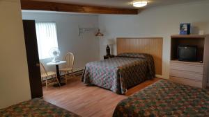 Postel nebo postele na pokoji v ubytování Heidi's Inn