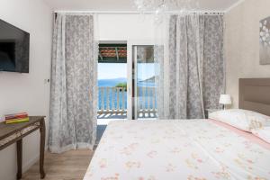 Posteľ alebo postele v izbe v ubytovaní Superb Beachfront Luxury Seaview with Private Beach