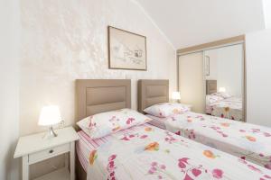 Posteľ alebo postele v izbe v ubytovaní Superb Beachfront Luxury Seaview with Private Beach