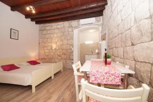 Posteľ alebo postele v izbe v ubytovaní Apartment Chupa