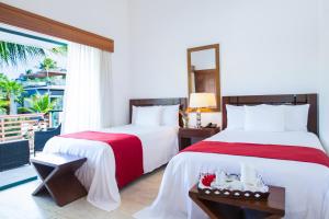 Tempat tidur dalam kamar di Sublime Samana