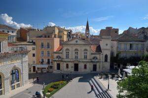 a view of a city with buildings at "San Giacomo Square Apt." in the heart of old town in Corfu Town