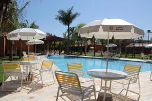 A piscina localizada em Hotel Pousada Brilho do Sol ou nos arredores