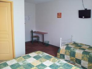 Postel nebo postele na pokoji v ubytování Tour Hôtel
