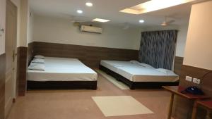 Gallery image of Temple City Hotels India Pvt. Ltd in Cholavandān