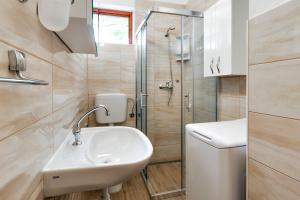 Kúpeľňa v ubytovaní Apartmani Prkačin