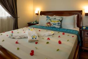 Voodi või voodid majutusasutuse Seashell Beach Villa toas