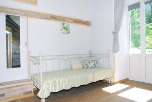 Postel nebo postele na pokoji v ubytování Maison Blanche Kyiv city center