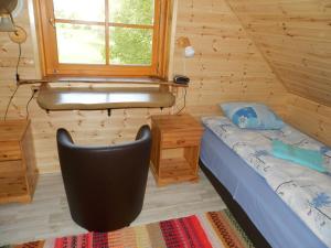 Ένα ή περισσότερα κρεβάτια σε δωμάτιο στο Ala-Laugu Holiday Home