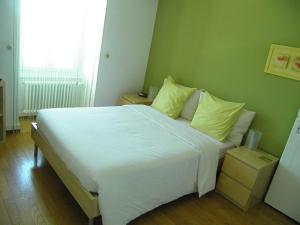 Postel nebo postele na pokoji v ubytování Auberge au Cavalier