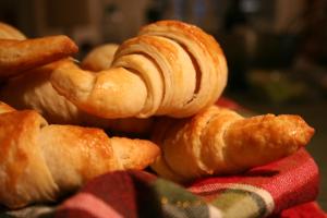 a pile of croissants sitting on top of a towel at B&B Dolcevita in Pompei