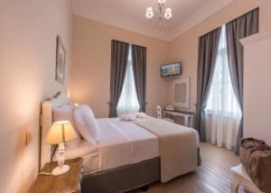 Postel nebo postele na pokoji v ubytování Palladian Home