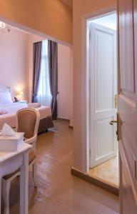 Postel nebo postele na pokoji v ubytování Palladian Home