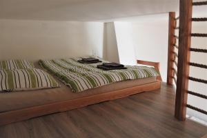 Postel nebo postele na pokoji v ubytování Apartmány Turold Mikulov