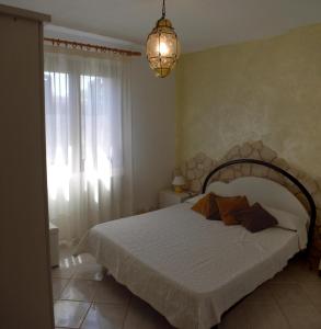 Postel nebo postele na pokoji v ubytování B&B Gianni e Pia