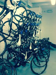 
a row of bicycles are lined up against a wall at Palace Hotel Wellness & Beauty in Bormio
