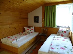 เตียงในห้องที่ Tirol-Haus Irma