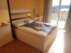 Postel nebo postele na pokoji v ubytování Guesthouse Mira