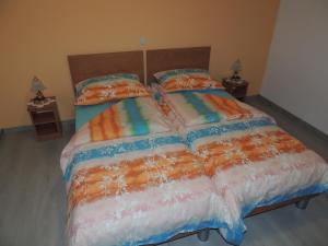 Postel nebo postele na pokoji v ubytování Apartments Palma