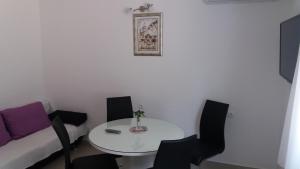 Posezení v ubytování Apartments Lovor