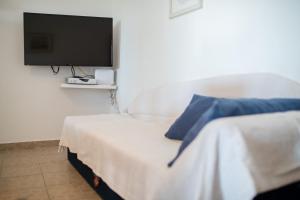 Katil atau katil-katil dalam bilik di Holiday Home Matahlija