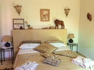 Postel nebo postele na pokoji v ubytování Riad Aquarelle By GE