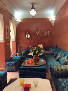 Posezení v ubytování Riad Aquarelle By GE