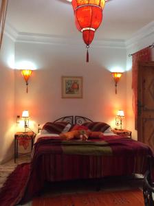 Postel nebo postele na pokoji v ubytování Riad Aquarelle By GE