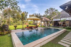 Πισίνα στο ή κοντά στο Villa Padi Menari