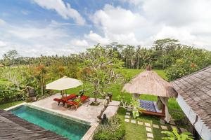 an image of a villa with a swimming pool at Villa Padi Menari in Ubud