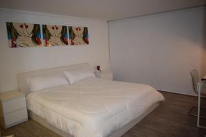 Postel nebo postele na pokoji v ubytování Blue Reef