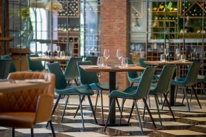 Restoran või mõni muu söögikoht majutusasutuses Hotel Forza Terra