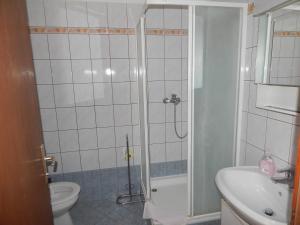 Koupelna v ubytování Apartments Vilanija