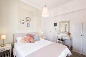 Postel nebo postele na pokoji v ubytování Hotel Oasis