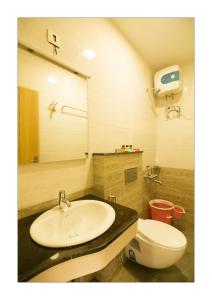 Koupelna v ubytování Hotel Ashoka