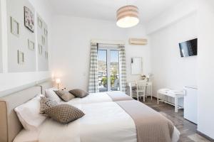 Postel nebo postele na pokoji v ubytování Hotel Oasis
