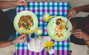 a plate of food on a table at Bayview Sunset in Ko Lipe