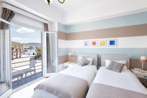 Postel nebo postele na pokoji v ubytování Hotel Oasis