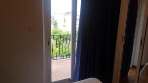 a view through a window of a house at Hostel can salvado in Cambrils