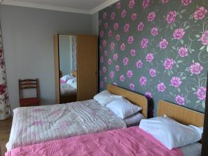 Voodi või voodid majutusasutuse Kvariati - Guest House toas