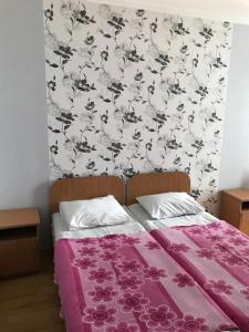 Voodi või voodid majutusasutuse Kvariati - Guest House toas