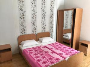 Voodi või voodid majutusasutuse Kvariati - Guest House toas