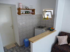 Kuchyň nebo kuchyňský kout v ubytování Guesthouse Bracanović