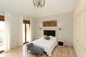 Posteľ alebo postele v izbe v ubytovaní Villa Las Lomas de Marbella