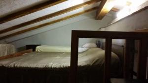 Postel nebo postele na pokoji v ubytování Tourist Farm Benčič