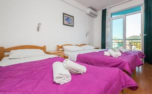 Postel nebo postele na pokoji v ubytování Motel Jadranka