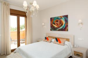 Posteľ alebo postele v izbe v ubytovaní Villa Las Lomas de Marbella