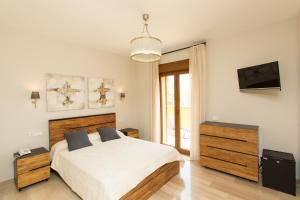 Posteľ alebo postele v izbe v ubytovaní Villa Las Lomas de Marbella