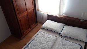 Postel nebo postele na pokoji v ubytování Apartmán Černý Důl